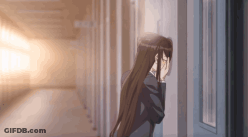 Girl With Long Hair Covering Face In Hallway GIF