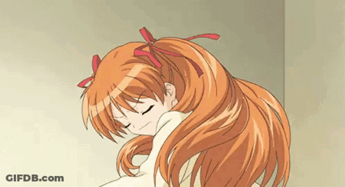 Girl With Long Red Hair Laying Down Eyes Closed GIF