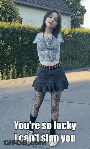 Girl With No Arm Standing On Sidewalk Saying You're So Lucky GIF