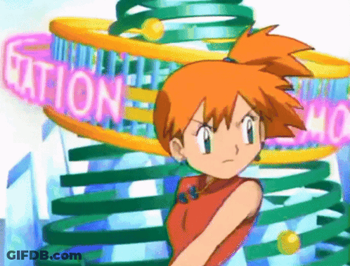Girl With Orange Hair Standing By Station Sign GIF