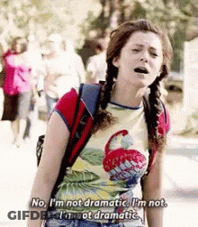 Girl With Pigtails And Backpack Says No I'm Not Dramatic GIF