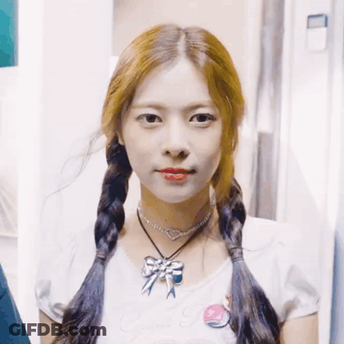 Girl With Pigtails And Necklace With Bow GIF