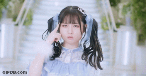 Girl With Pigtails And Tiara Making Funny Face GIF
