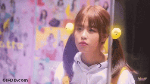 Girl With Pigtails And Yellow Duck In Hair GIF