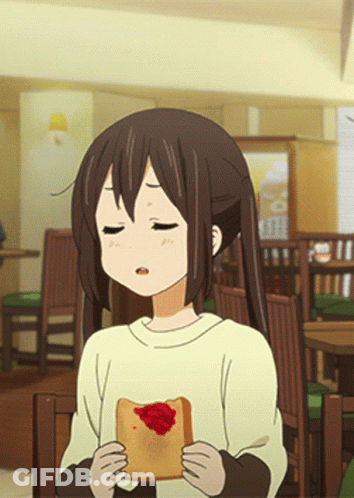 Girl With Pigtails Holding Toast With Strawberry Jam GIF