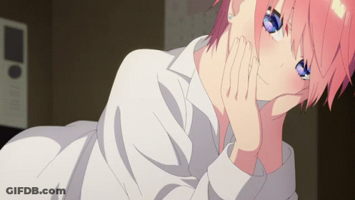 Girl With Pink Hair And Blue Eyes Laying Down With Hand On Chin GIF