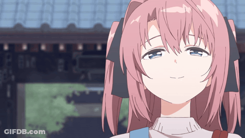 Girl With Pink Hair And Blue Eyes Looking At Camera GIF