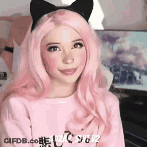 Girl With Pink Hair And Cat Ears Smiling In Pink Sweater GIF