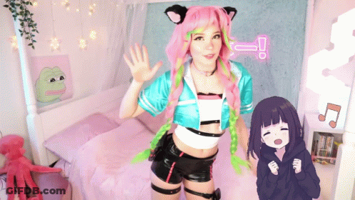 Girl With Pink Hair And Green Braids Next To Cartoon Girl GIF