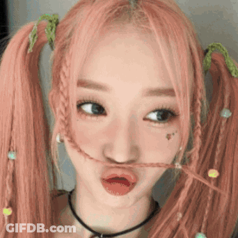 Girl With Pink Hair And Pigtails Making Funny Face GIF