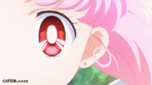 Girl With Pink Hair And Red Eye Close Up GIF