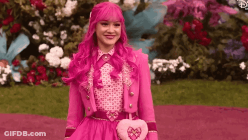 Girl With Pink Hair In Flower Garden GIF