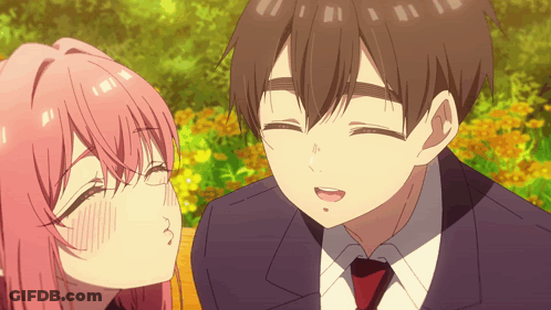Girl With Pink Hair Kissing Boy In Suit And Tie GIF