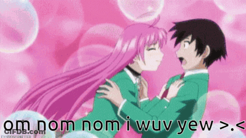 Girl With Pink Hair Kissing Boy With Black Hair GIF
