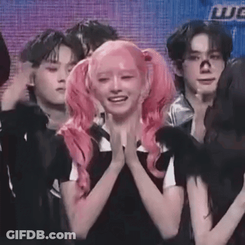 Girl With Pink Hair Pigtails On Stage GIF