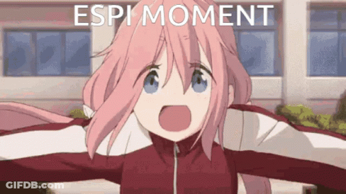 Girl With Pink Hair Reading Manga In Library GIF