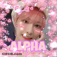 Girl With Pink Hair Surrounded By Hearts GIF