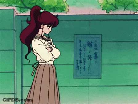 Girl With Ponytail In Front Of Sign Saying A GIF