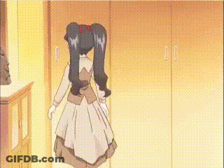 Girl With Ponytails Standing In Hallway GIF