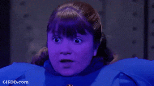 Girl With Purple Hair And Blue Coat GIF