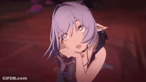Girl With Purple Hair And Blue Eyes Sitting Head On Hand GIF
