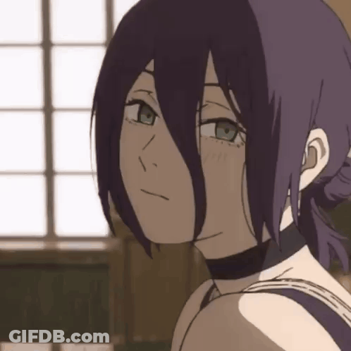 Girl With Purple Hair And Green Eyes Looking At Camera GIF