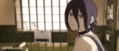Girl With Purple Hair Sitting At Table GIF