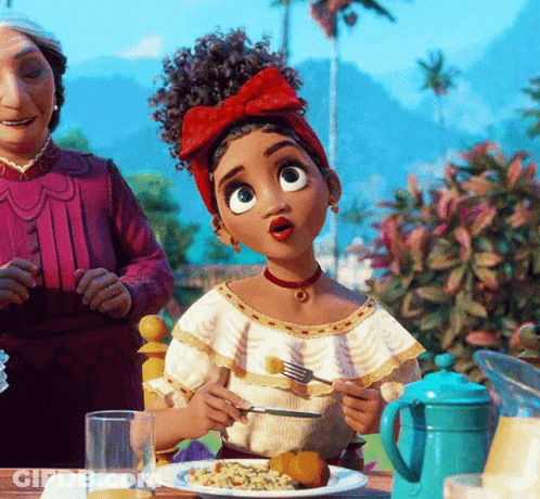 Girl With Red Bow At Table With Food GIF