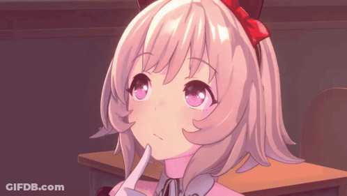 Girl With Red Bow Sitting At Desk GIF