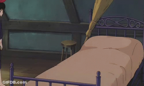 Girl With Red Bow Standing On Bed GIF