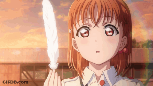 Girl With Red Eyes Holding Feather GIF