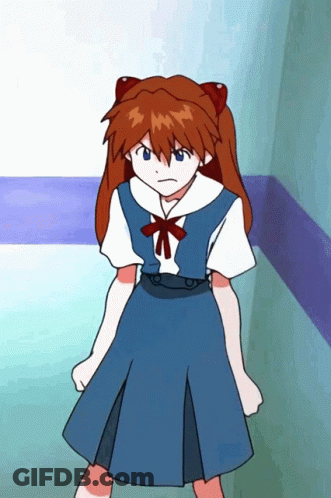 Girl With Red Hair And Blue Eyes In Blue School Uniform GIF