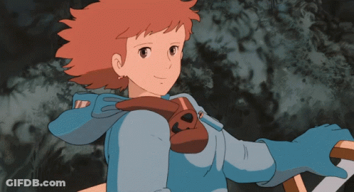 Girl With Red Hair And Blue Jacket Smiling GIF