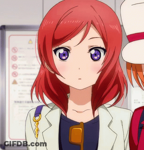 Girl With Red Hair And Purple Eyes In Sunglasses And White Jacket GIF