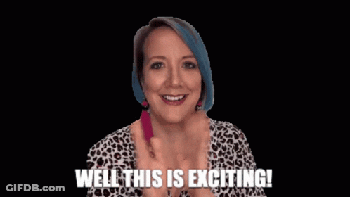 Girl With Red Hair Holding Cell Phone GIF