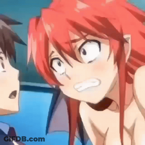 Girl With Red Hair Looking At Boy With Brown Hair GIF