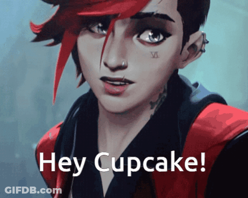Girl With Red Hair Saying Hey Cupcake GIF