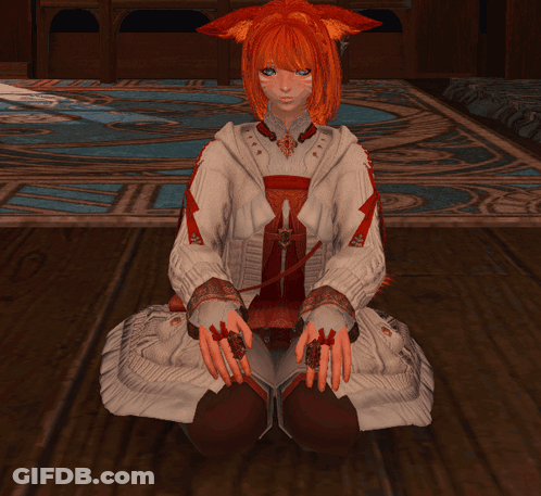 Girl With Red Hair Sitting On Floor Hands On Knees GIF