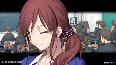 Girl With Red Hair Smiling In Classroom GIF