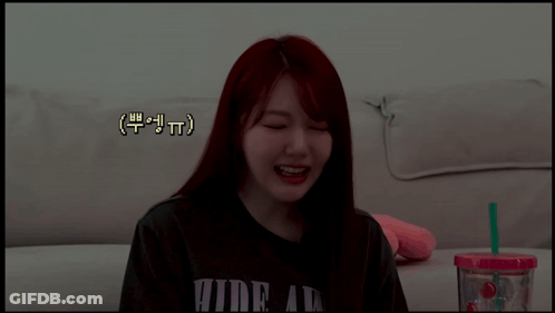 Girl With Red Hair Wearing Hide At Shirt GIF
