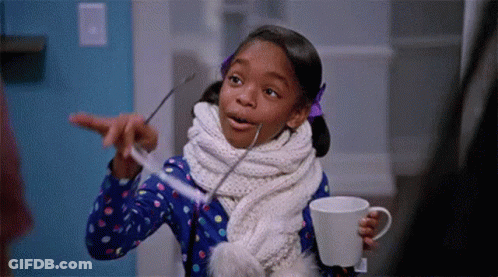 Girl With Scarf Glasses Holding Coffee And Syringe GIF