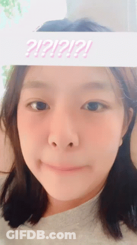 Girl With Sign Saying ? ! ? ! ? GIF