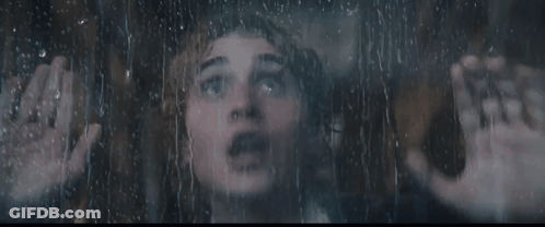 Girl With Snake Around Neck Looking At Woman GIF