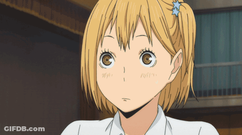 Girl With Star In Hair Looks Surprised GIF