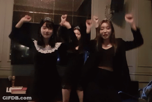 Girl With Tiara Standing Next To Two Girls GIF