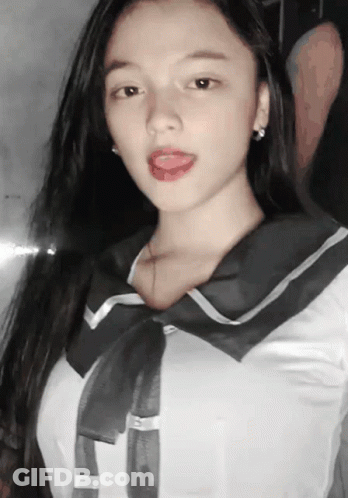 Girl With Tongue Out In Sailor Uniform GIF