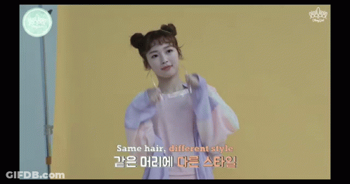 Girl With Two Buns In Purple Jacket GIF