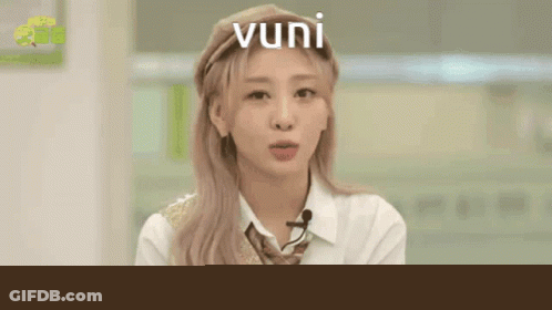 Girl With Vuni Written On Head GIF