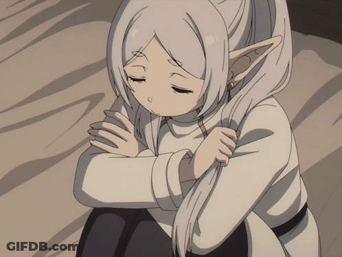Girl With White Hair And Elf Ears Hugging Knees GIF