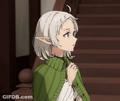 Girl With White Hair And Elf Ears In Green Cape GIF